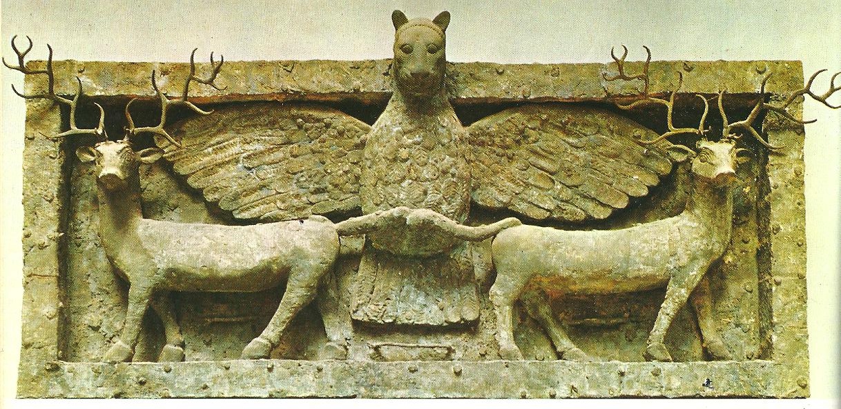Reliéf z měděné desky na dřevěném podkladu z Obejdu, sumerské II. raně dynastické období, 2600–2350 př. n. l. Převzato z G. Garbini: Starověké kultury Předního východu (1971). Pták se lví hlavou Imdugud, akkadsky Anzu. Tentokrát mají jelení podobu blíženci. Vidíme opět výtvarné podání předobrazu pozdějších tří mytologických (pohádkových) bratrů, z nichž nejmladší je úspěšný. Zde vidíme zobrazení slunečního Potomka vyjadřujícího pozemský rok. Imdugud